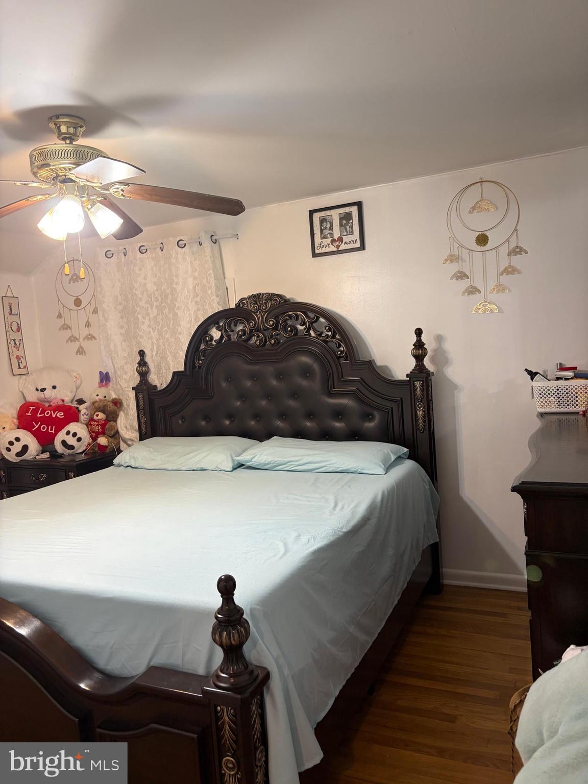 7404 Wyndam Road Pennsauken, NJ 08110 - Photo 22 of 50 a bedroom with a bed and a chandelier