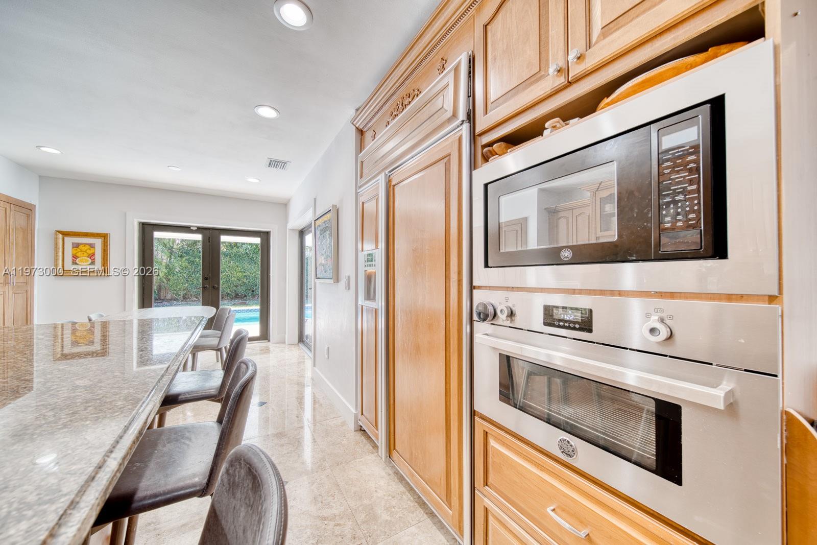 9220 Southwest 102nd Street Miami, FL 33176 - Photo 13 of 53 a view of a dining room with furniture window and outside view
