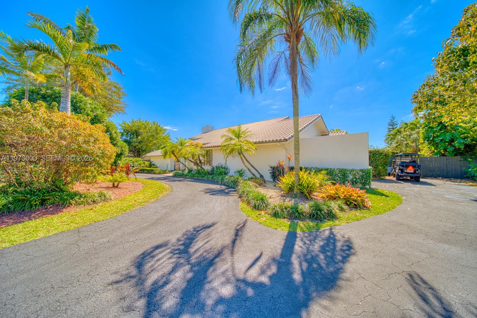 9220 Southwest 102nd Street Miami, FL 33176 - Photo 3 of 53 a view of a swimming pool with a patio