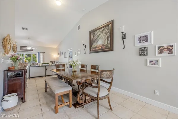 a view of a dining room with furniture