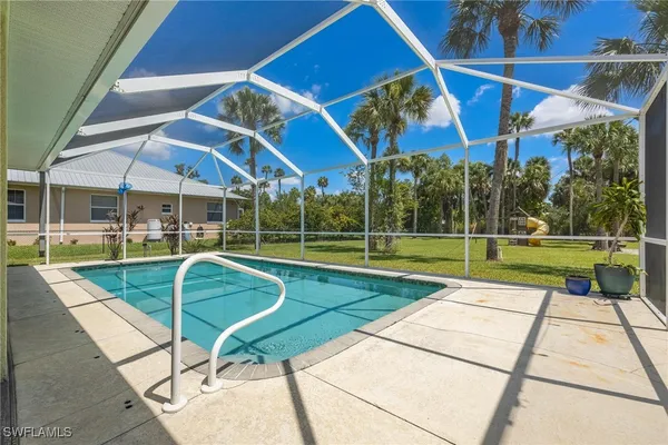 a view of a house with a swimming pool