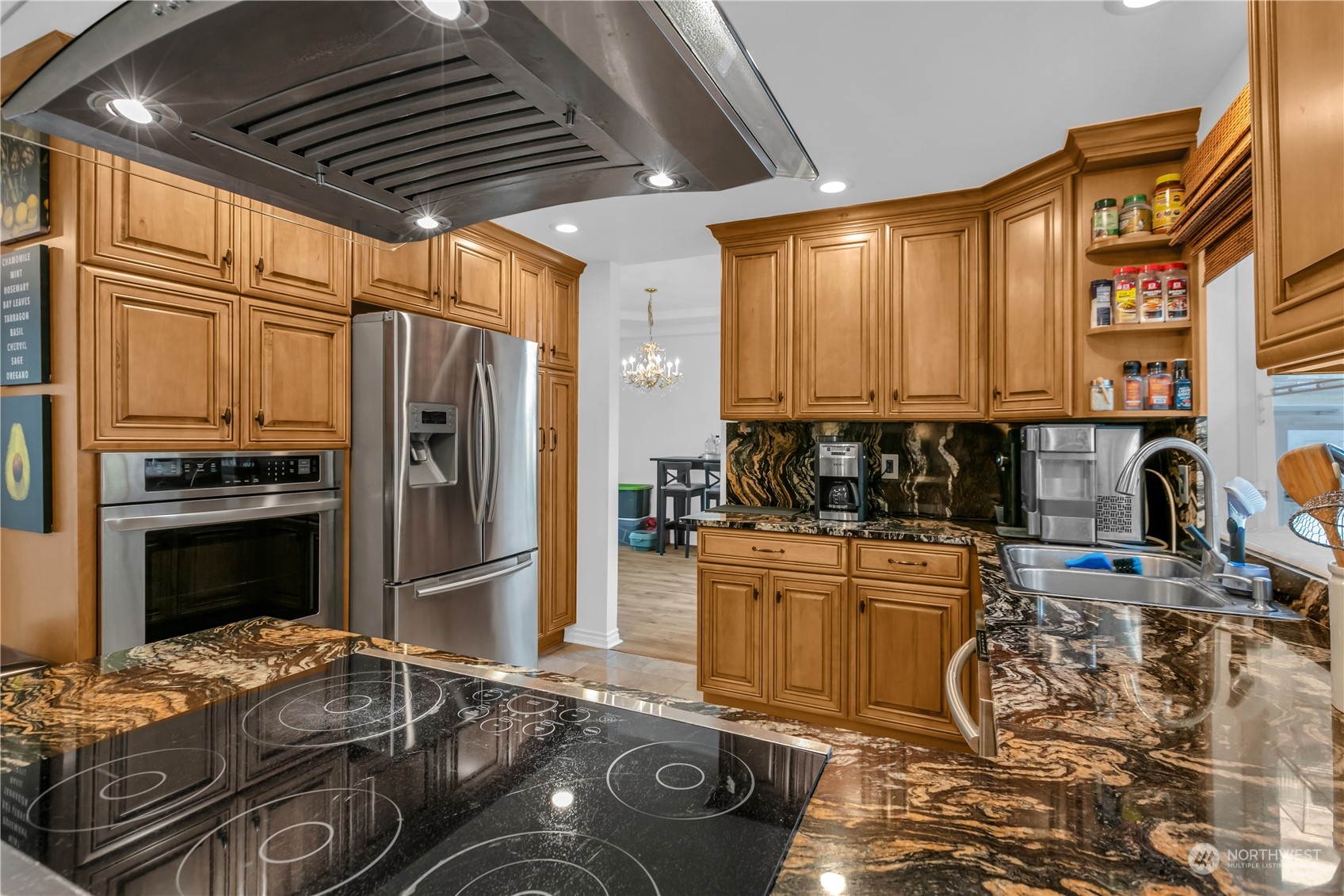 1130 Southwest 354th Street Federal Way, WA 98023 - Photo 12 of 25 a kitchen with stainless steel appliances granite countertop a stove a refrigerator and a cabinets
