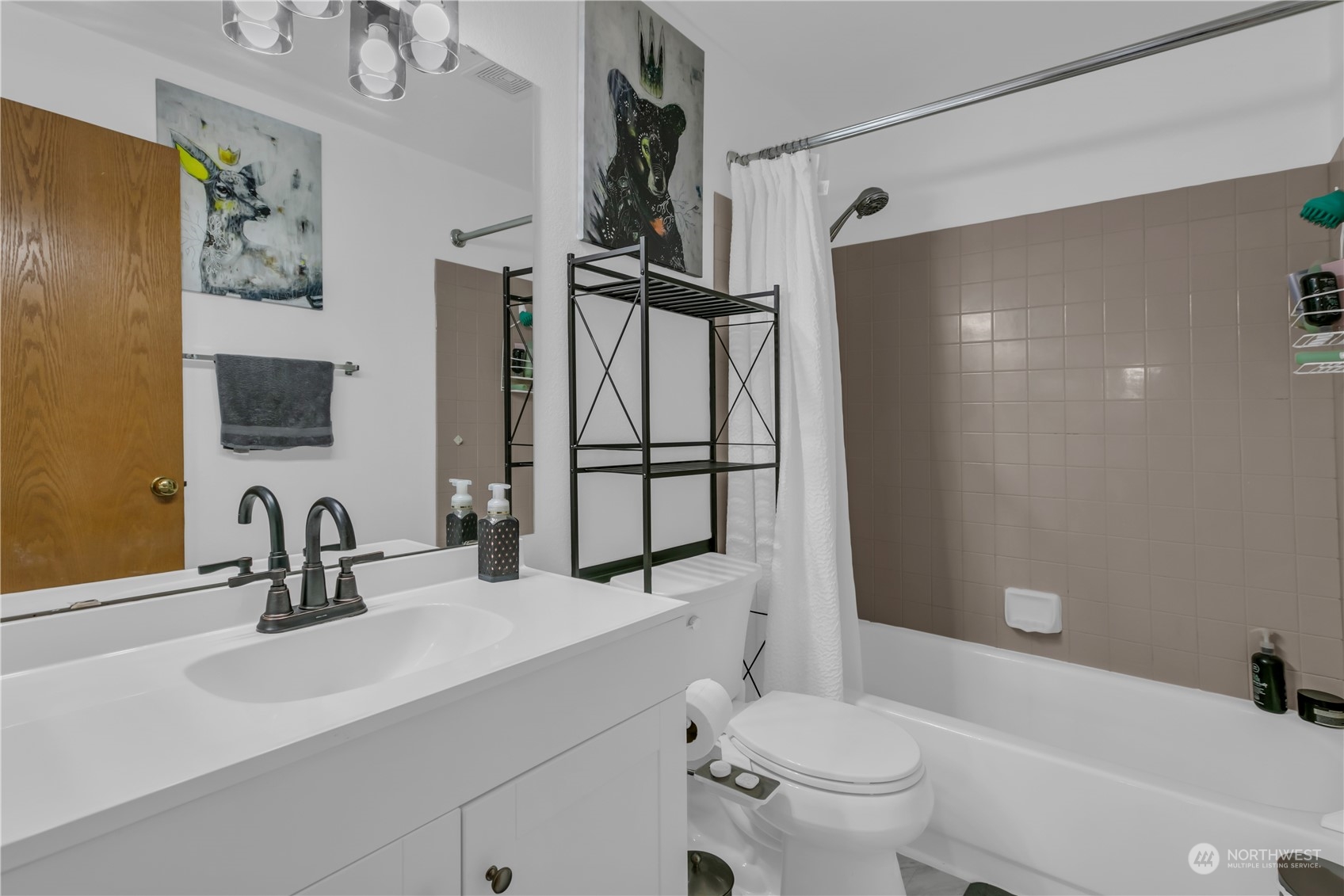1130 Southwest 354th Street Federal Way, WA 98023 - Photo 19 of 25 a bathroom with a sink toilet and shower