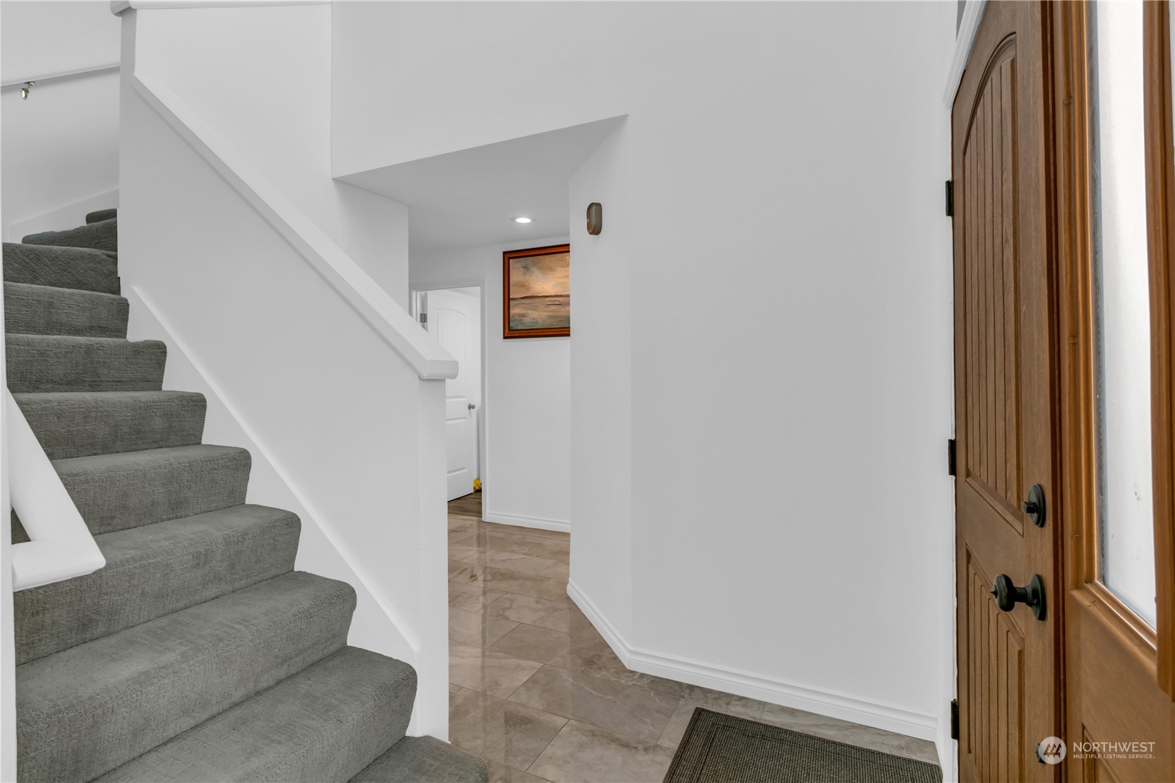 1130 Southwest 354th Street Federal Way, WA 98023 - Photo 6 of 25 a view of entryway and hall with wooden floor