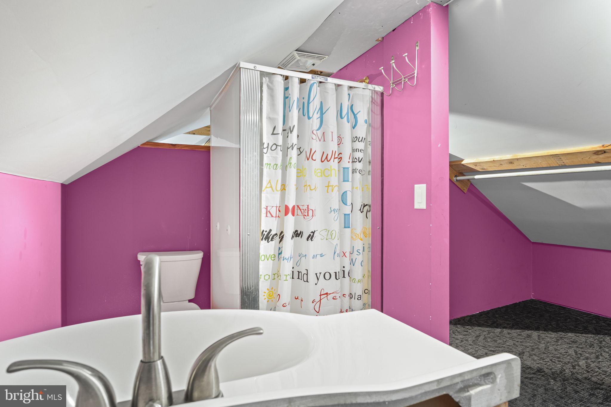 2065 Goldenville Road Gettysburg, PA 17325 - Photo 28 of 51 a bedroom with a bed and a dresser with potted plant