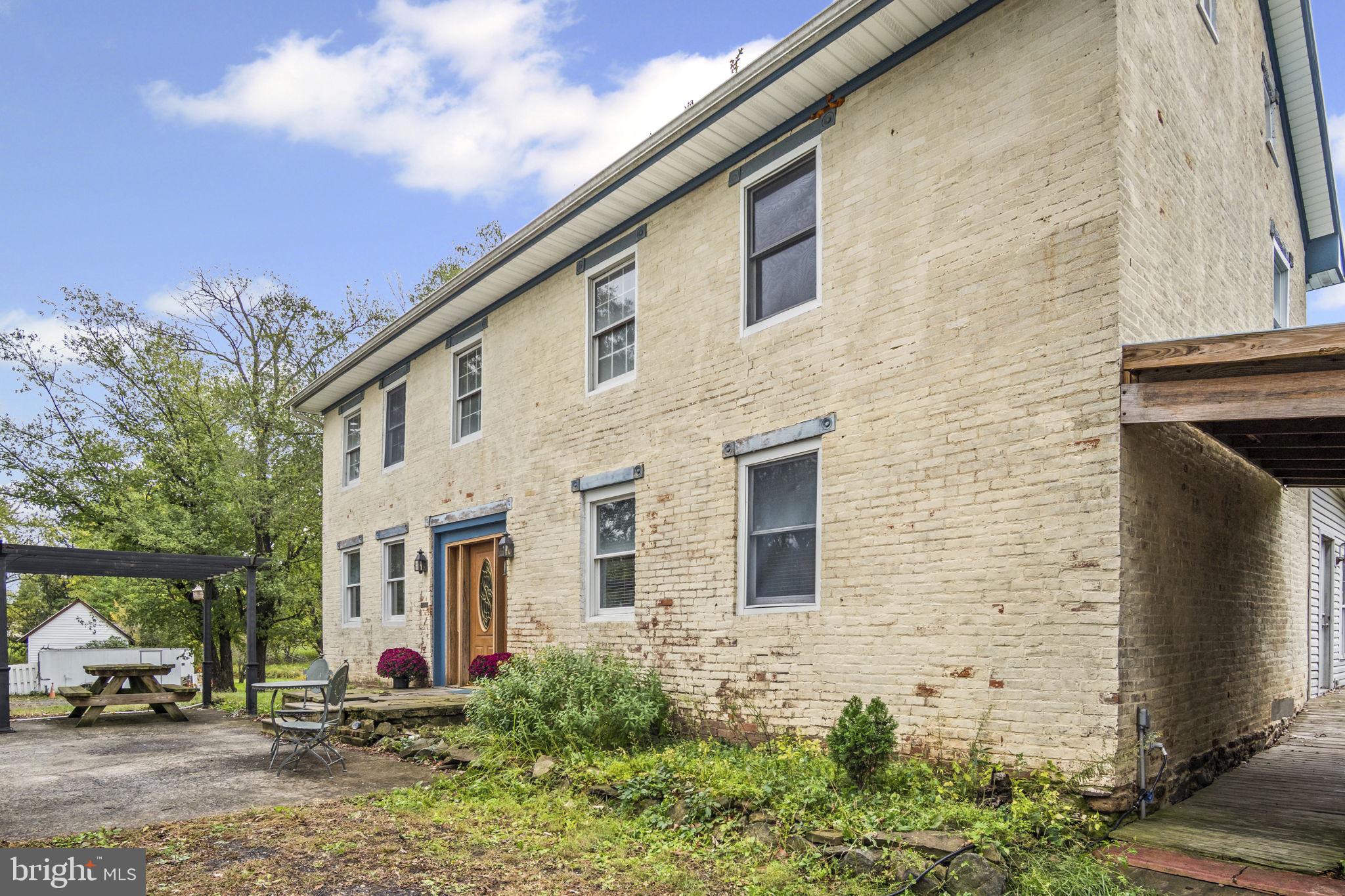 2065 Goldenville Road Gettysburg, PA 17325 - Photo 32 of 51 a front view of a house with cars parked