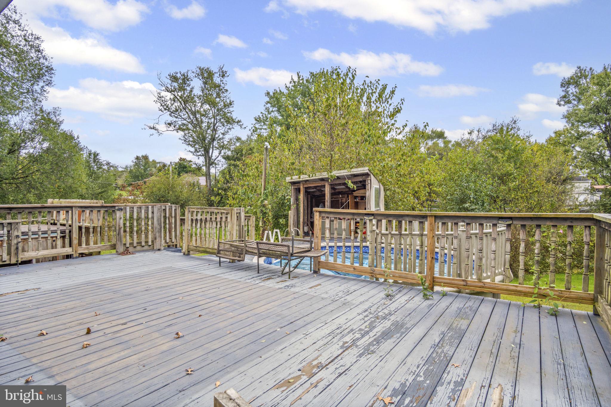 2065 Goldenville Road Gettysburg, PA 17325 - Photo 36 of 51 a view of a balcony with wooden floor and fence