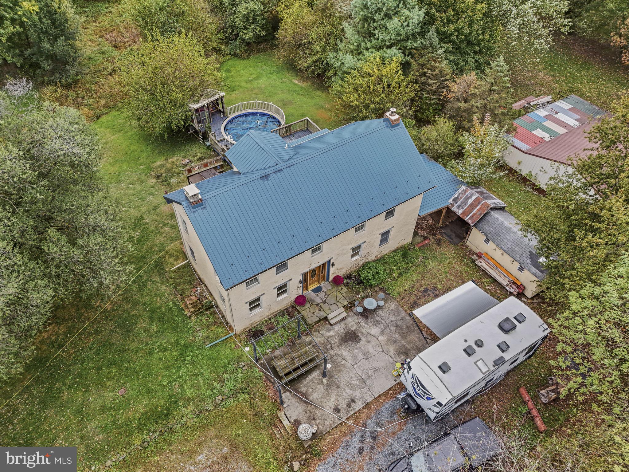 2065 Goldenville Road Gettysburg, PA 17325 - Photo 41 of 51 an aerial view of a house with garden space and street view