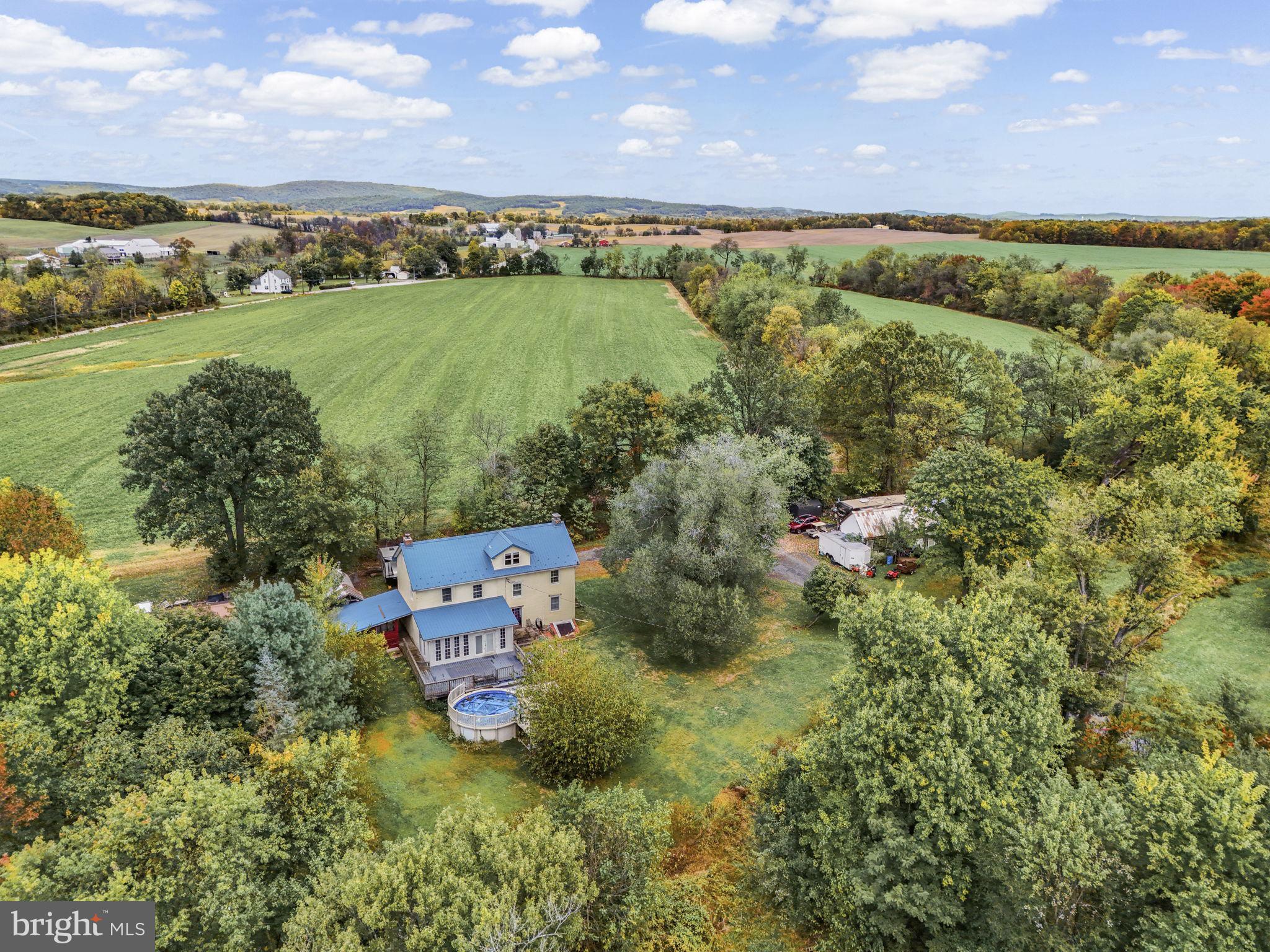 2065 Goldenville Road Gettysburg, PA 17325 - Photo 49 of 51 an aerial view of a city with lots of residential buildings lake and ocean view