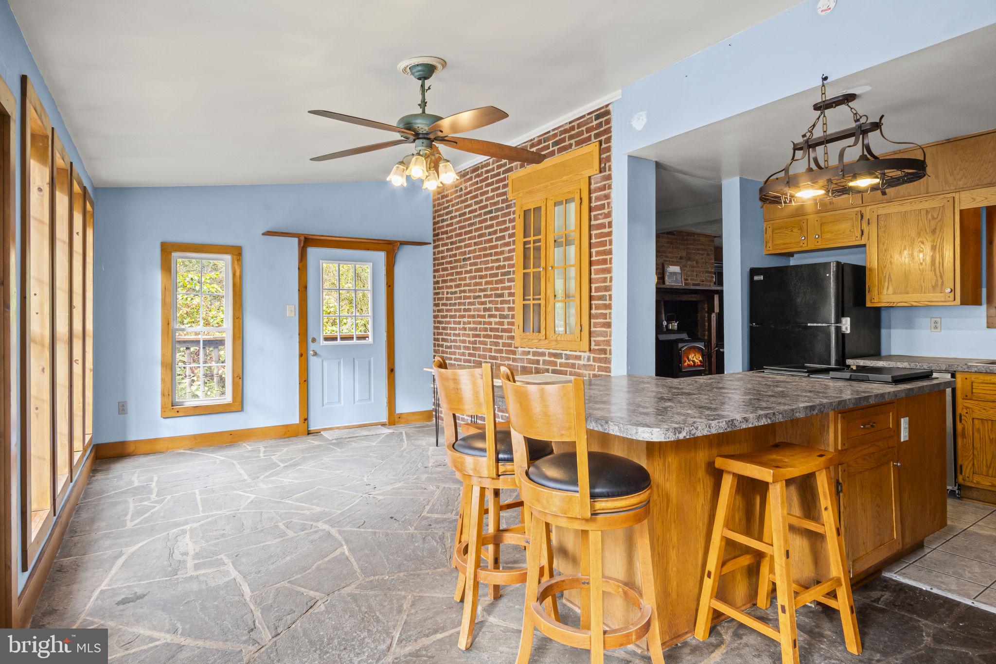 2065 Goldenville Road Gettysburg, PA 17325 - Photo 6 of 51 a kitchen with stainless steel appliances granite countertop a sink and a granite counter tops