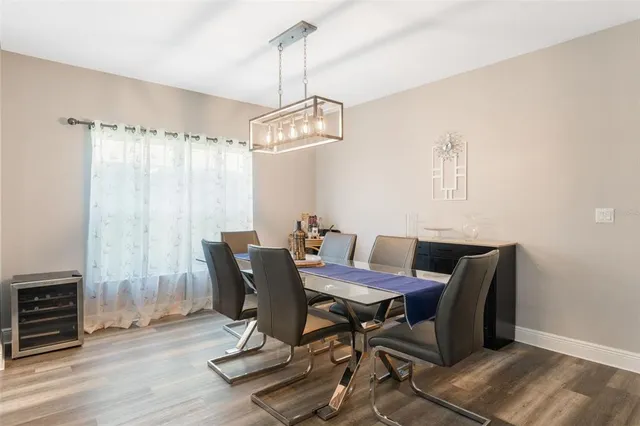 a view of kitchen with cabinets and wooden floor