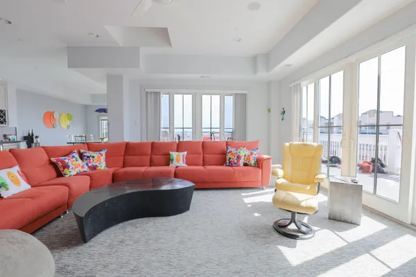 a living room with furniture or couch and a window
