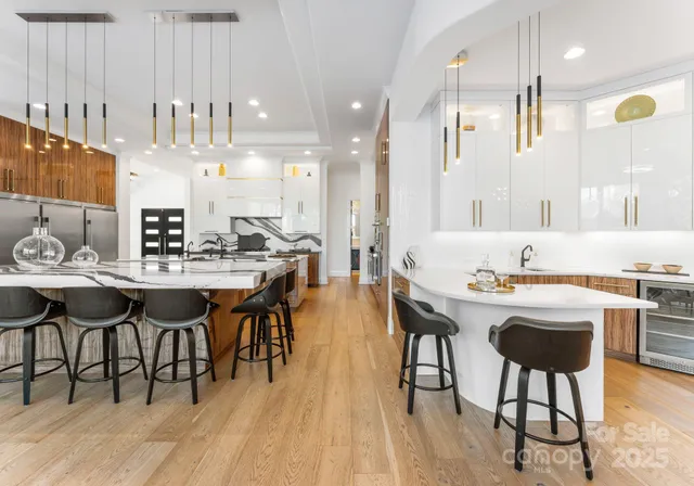 a kitchen with a table and chairs in it
