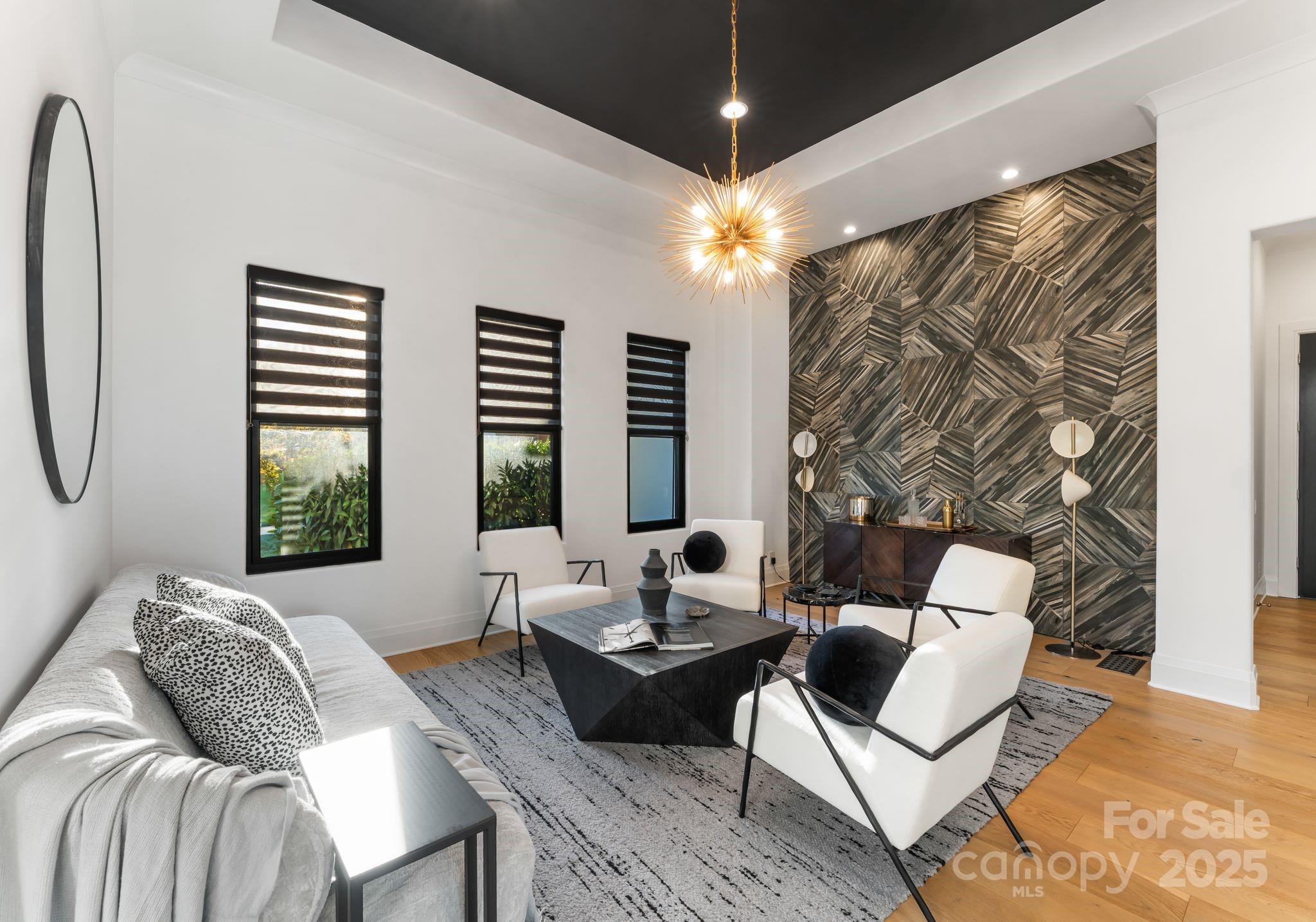 134 Cape Cod Way Mooresville, NC 28117 - Photo 16 of 46 a living room with furniture and a large window