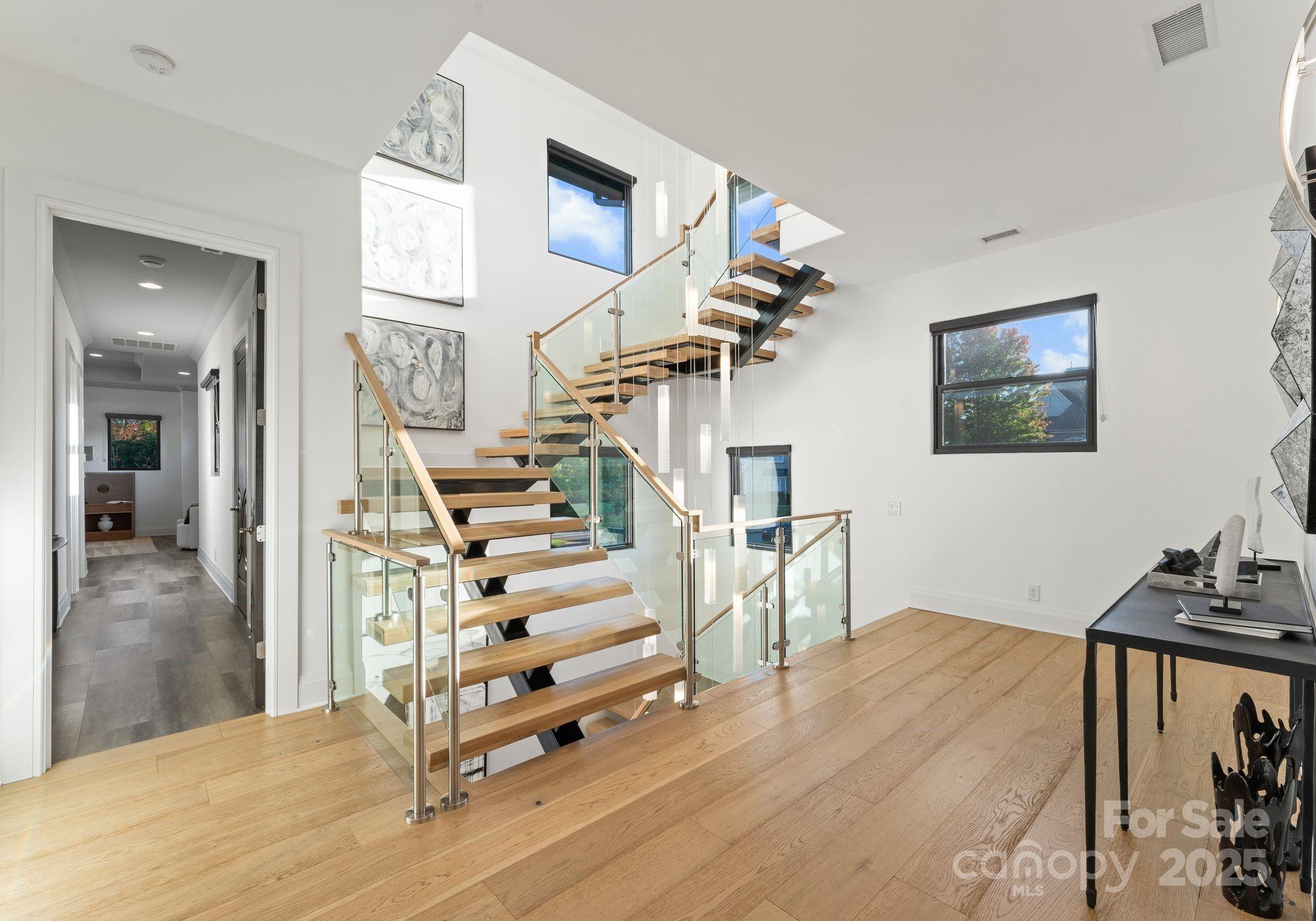 134 Cape Cod Way Mooresville, NC 28117 - Photo 25 of 46 a view of entryway and hall with wooden floor