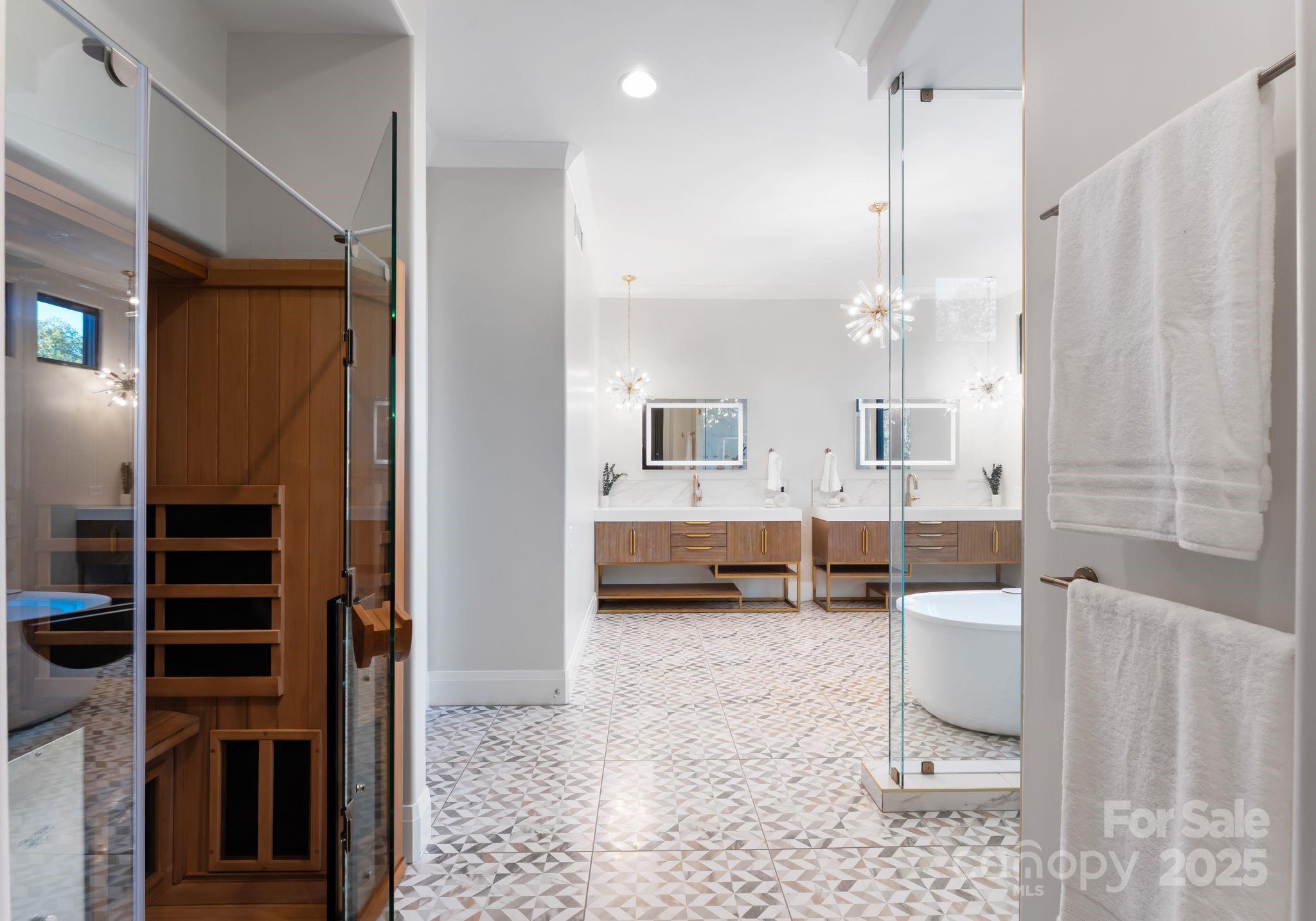 134 Cape Cod Way Mooresville, NC 28117 - Photo 29 of 46 a bathroom with a double vanity sink a mirror and a shower