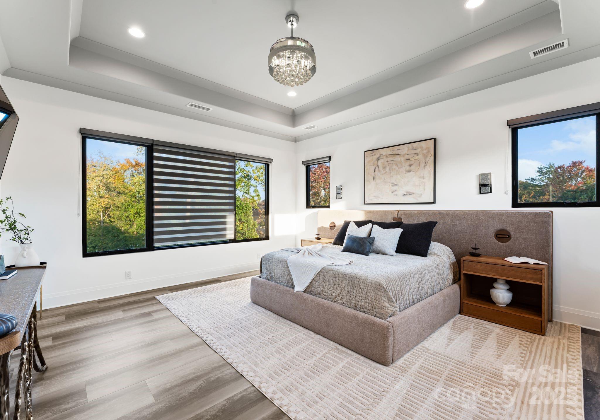 134 Cape Cod Way Mooresville, NC 28117 - Photo 31 of 46 a spacious bedroom with a large bed and a window