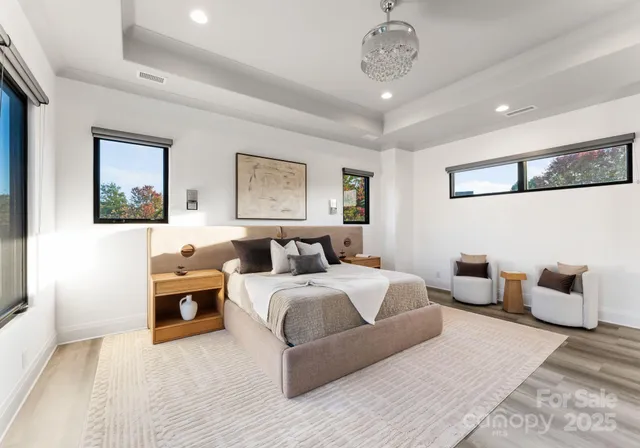 a bedroom with bed and window