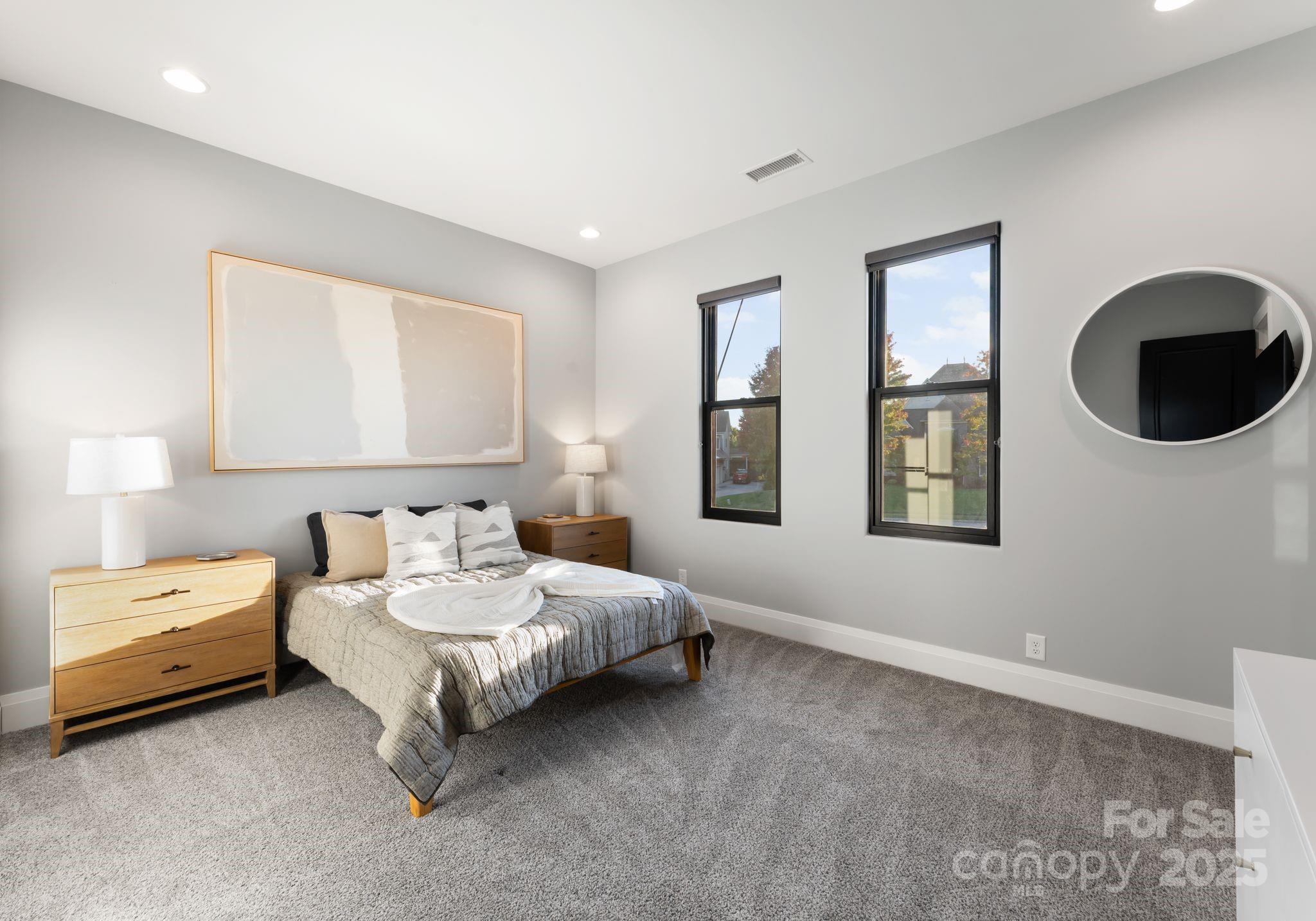 134 Cape Cod Way Mooresville, NC 28117 - Photo 35 of 46 a spacious bedroom with a bed and window