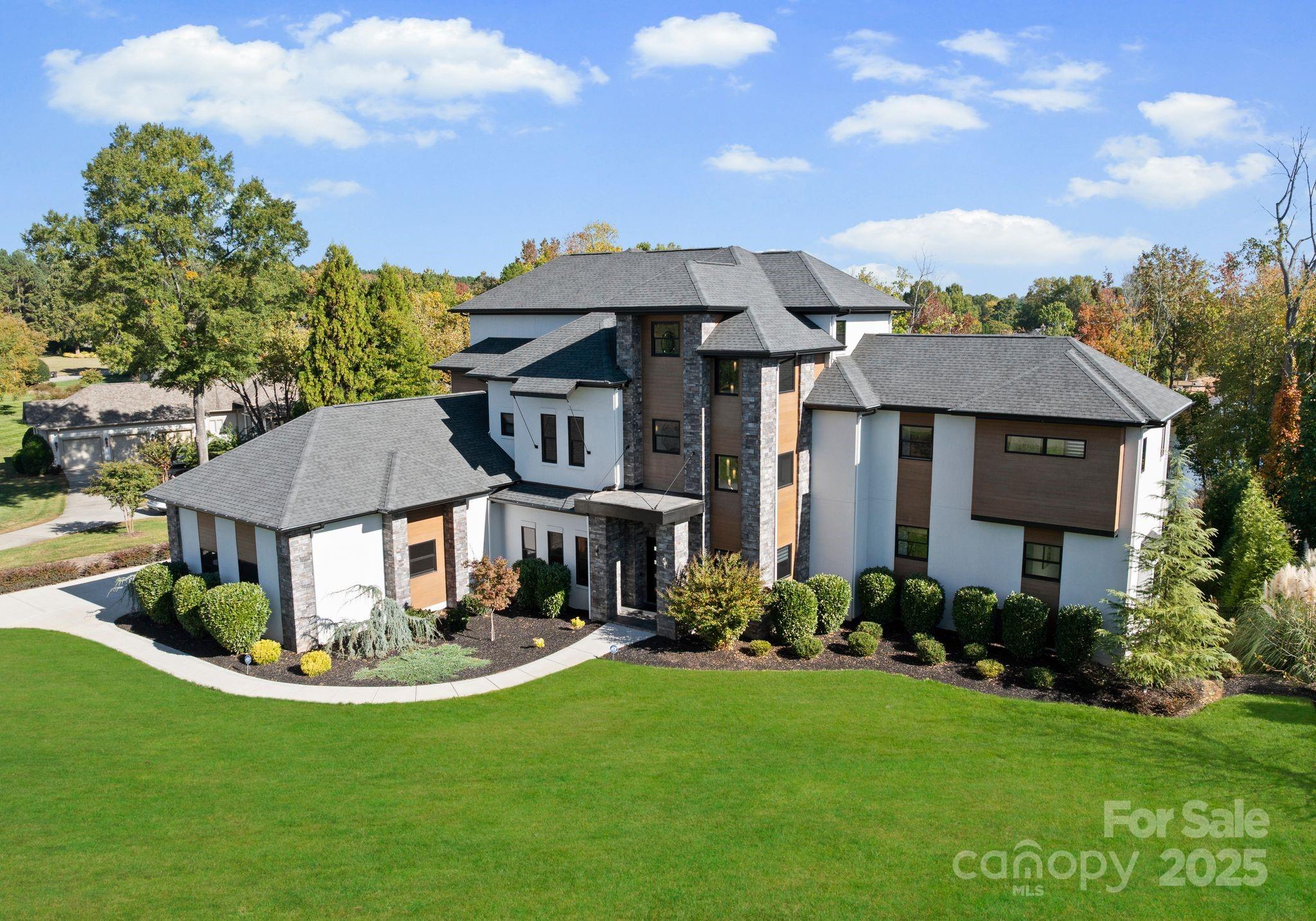 134 Cape Cod Way Mooresville, NC 28117 - Photo 45 of 46 a front view of a house with garden