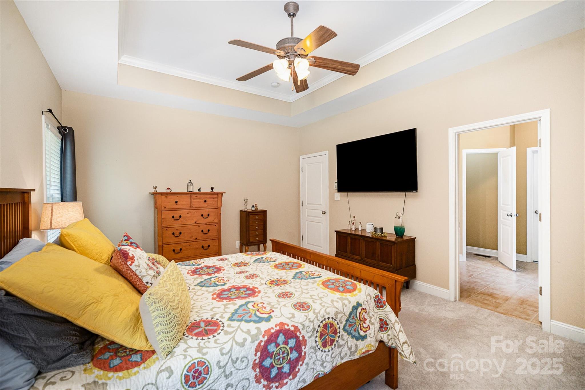 1846 Sam Smith Road Fort Mill, SC 29708 - Photo 15 of 33 a bedroom with a bed and a flat screen tv