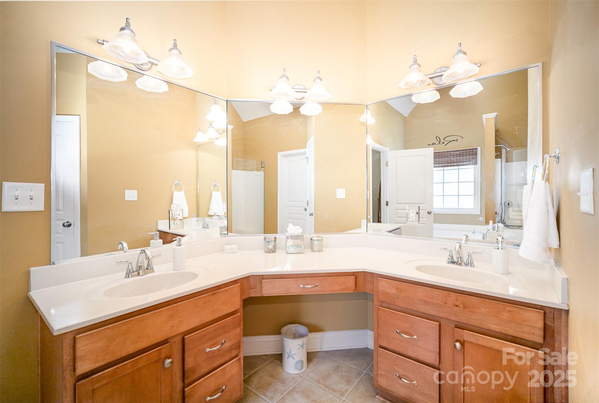 1846 Sam Smith Road Fort Mill, SC 29708 - Photo 16 of 33 a bathroom with a sink double vanity and a mirror