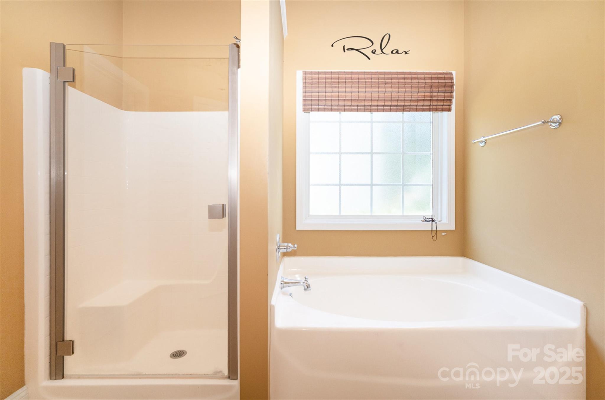 1846 Sam Smith Road Fort Mill, SC 29708 - Photo 17 of 33 a bathroom with a bathtub and a shower