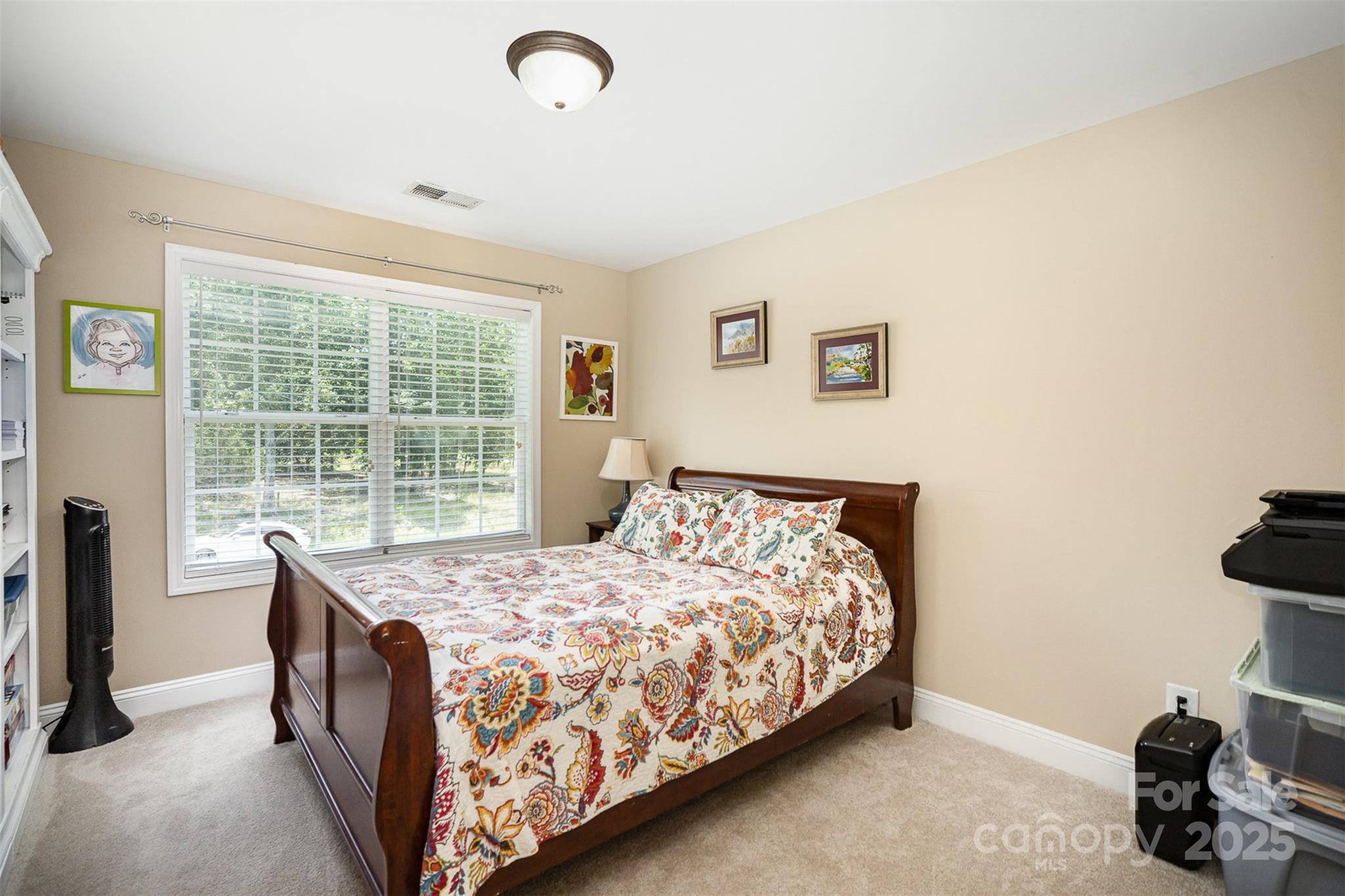 1846 Sam Smith Road Fort Mill, SC 29708 - Photo 18 of 33 a bedroom with a bed and a window