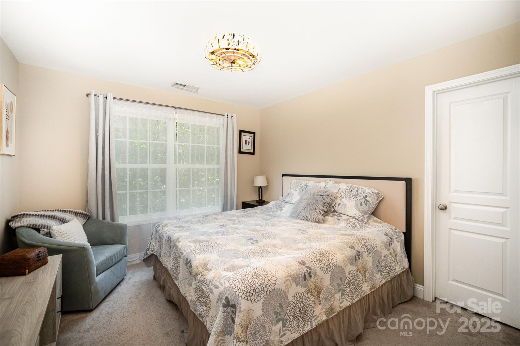 1846 Sam Smith Road Fort Mill, SC 29708 - Photo 19 of 33 a bedroom with a bed and painting on the wall