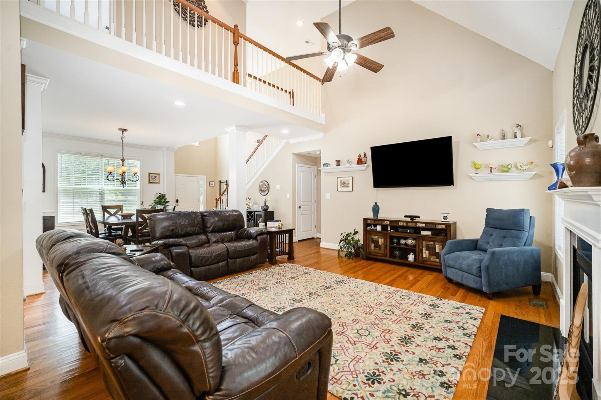 1846 Sam Smith Road Fort Mill, SC 29708 - Photo 3 of 33 a living room with furniture and a flat screen tv