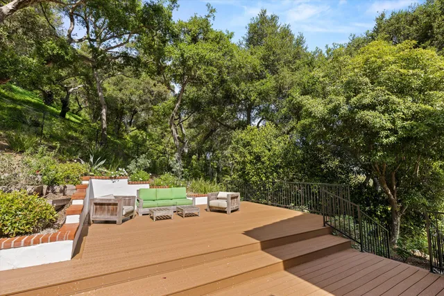swimming pool view with a seating space