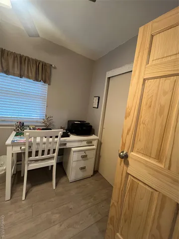 a room with a stove and a table