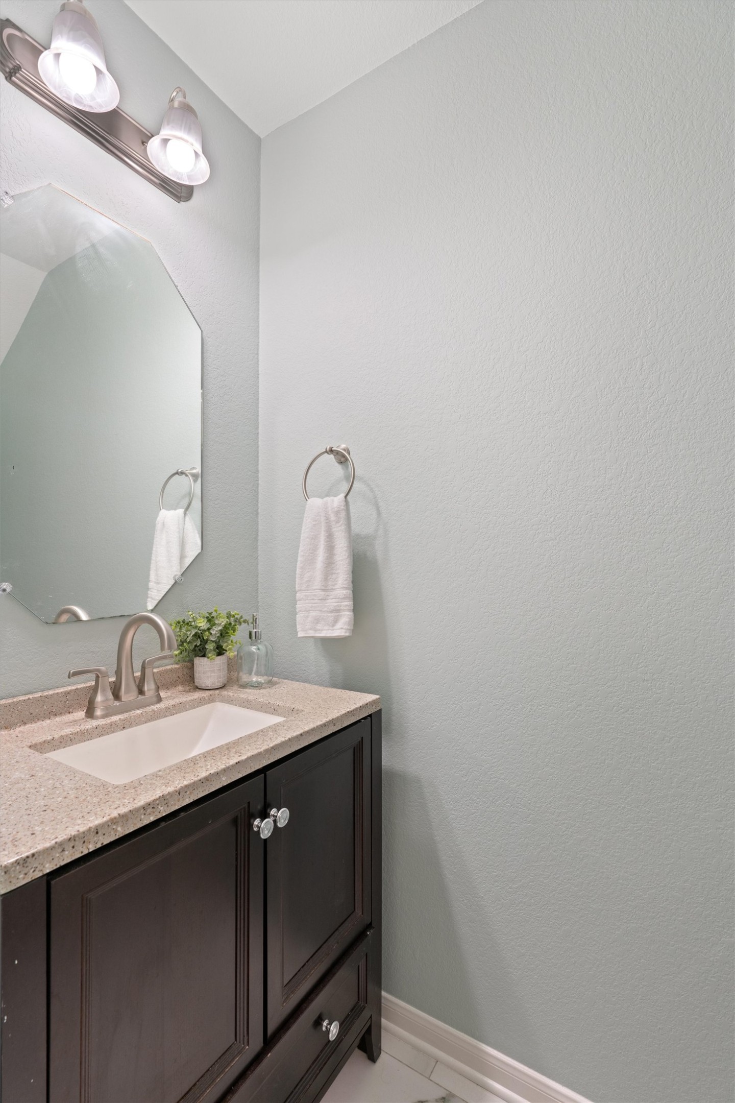 505 Granger Road Georgetown, TX 78626 - Photo 16 of 34 This is a half bath in the hallway across from the primary bedroom. The flooring in this half bath has also been replaced.