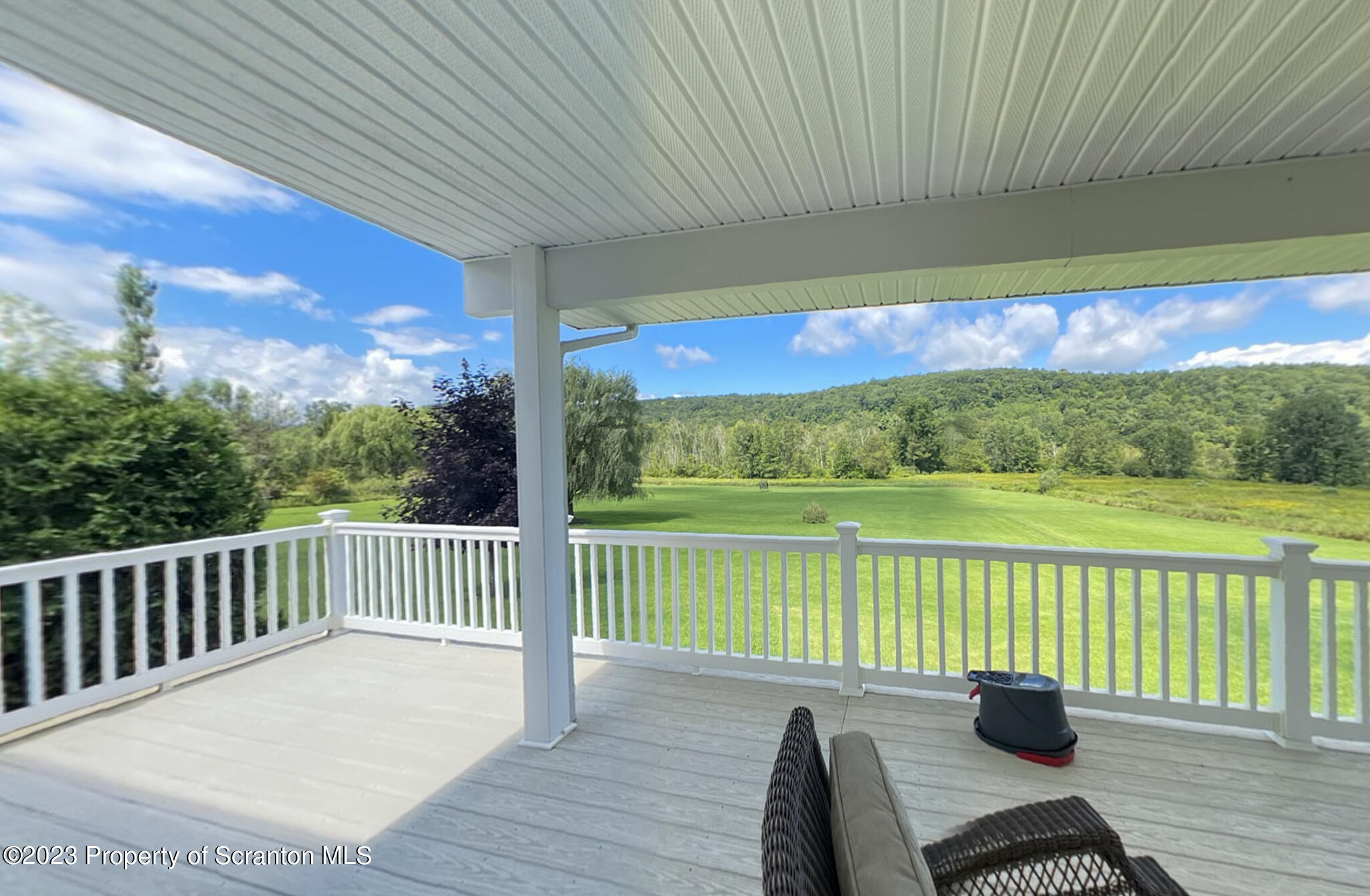 1213 Post Hill Road Falls, PA 18615 - Photo 11 of 21 a view of balcony with furniture and garden