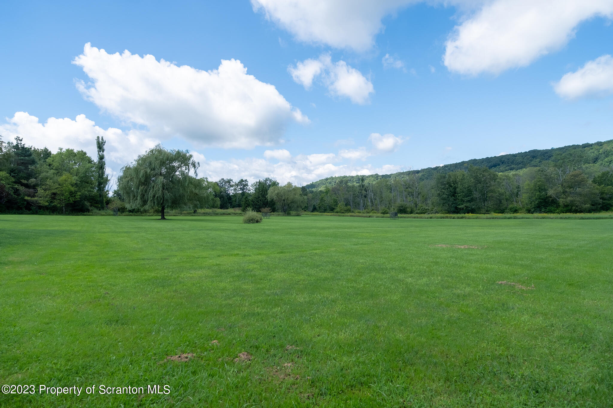 1213 Post Hill Road Falls, PA 18615 - Photo 14 of 21 a view of a grassy field