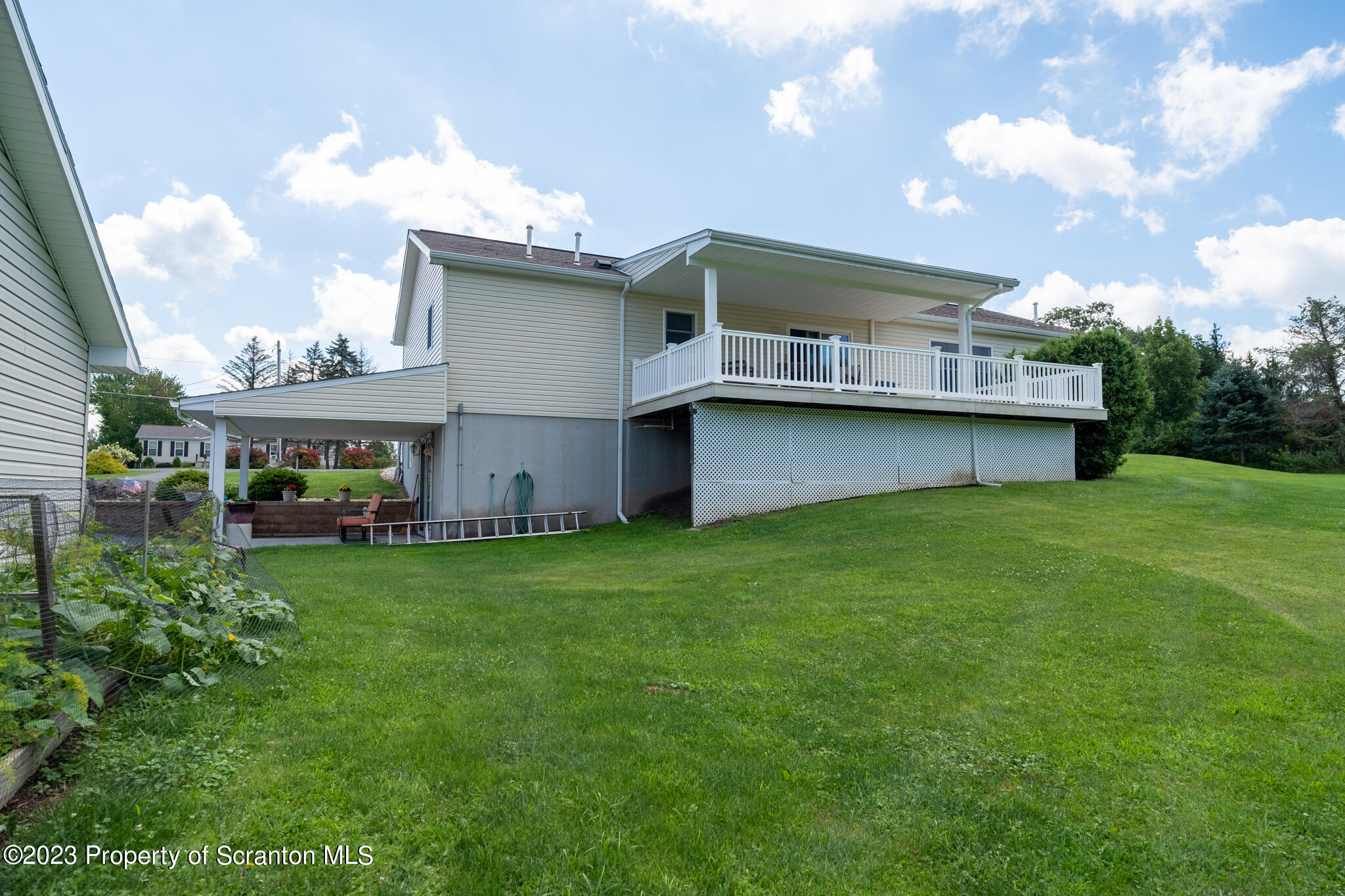1213 Post Hill Road Falls, PA 18615 - Photo 15 of 21 a view of a house with a backyard