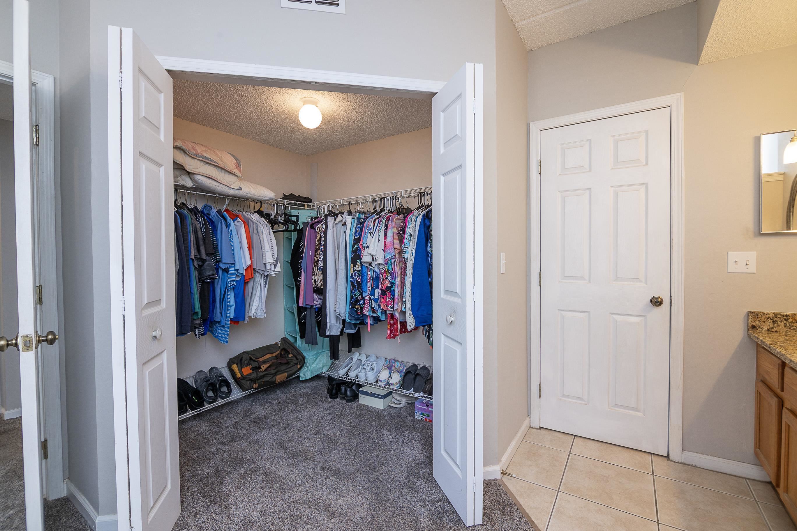 1 Talavera Court St. Augustine, FL 32086 - Photo 15 of 28 a view of walk in closet with clothes