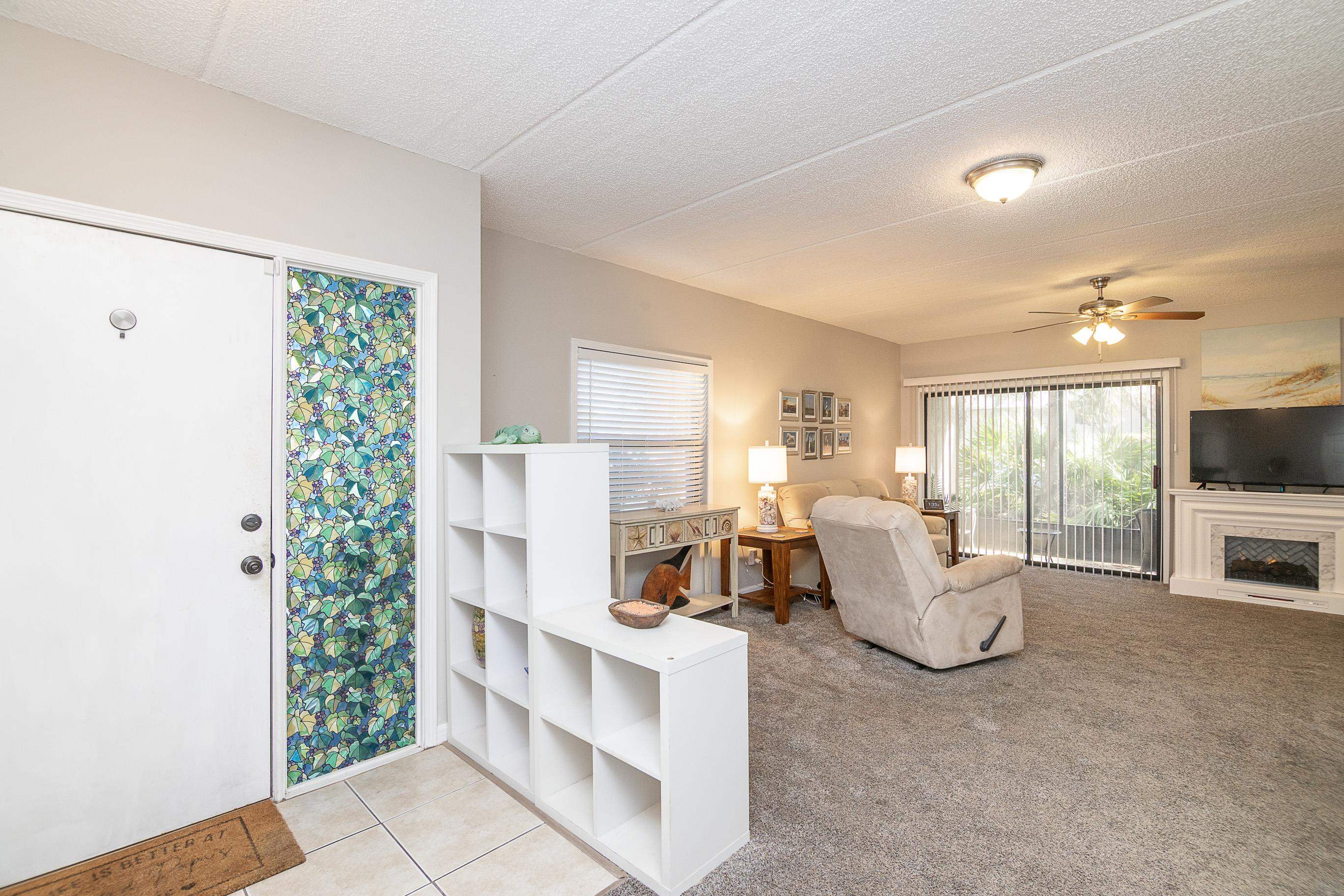 1 Talavera Court St. Augustine, FL 32086 - Photo 5 of 28 a living room with furniture and a flat screen tv