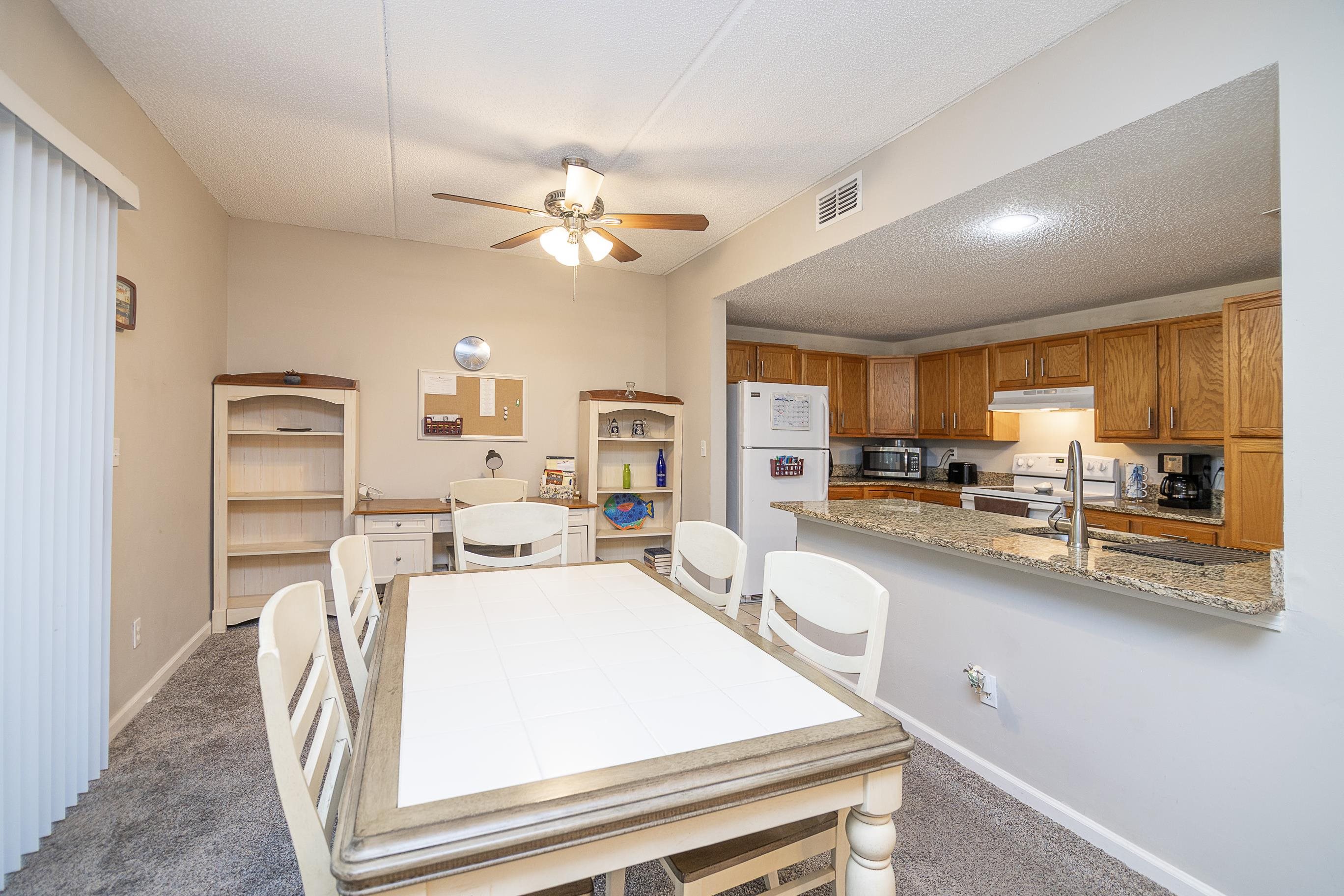 1 Talavera Court St. Augustine, FL 32086 - Photo 10 of 28 a very nice looking dining room with a large window and chandelier