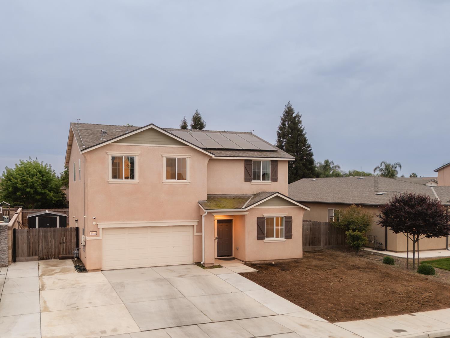 1945 East Gum Avenue Reedley, CA 93654 - Photo 3 of 31 a view of front of house with a yard