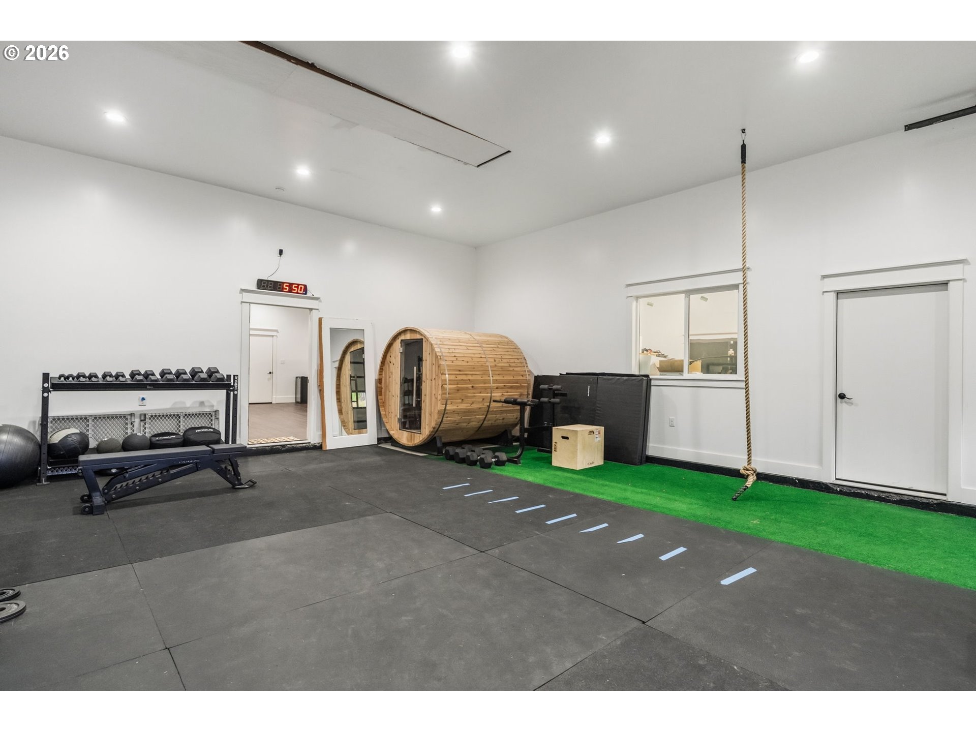 89093 Marcola Road Springfield, OR 97478 - Photo 6 of 25 a living room with furniture and a gym machine