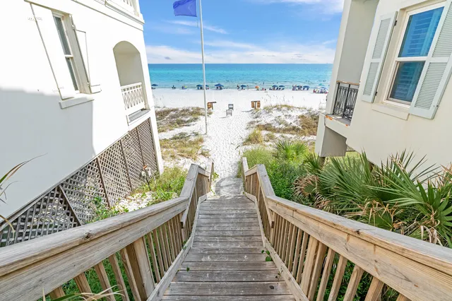 a view of balcony with wooden floor