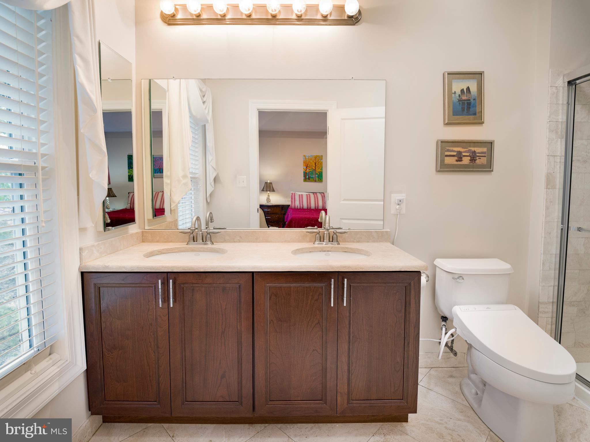 236 West Spring Avenue Ardmore, PA 19003 - Photo 15 of 30 a bathroom with a sink vanity mirror and toilet