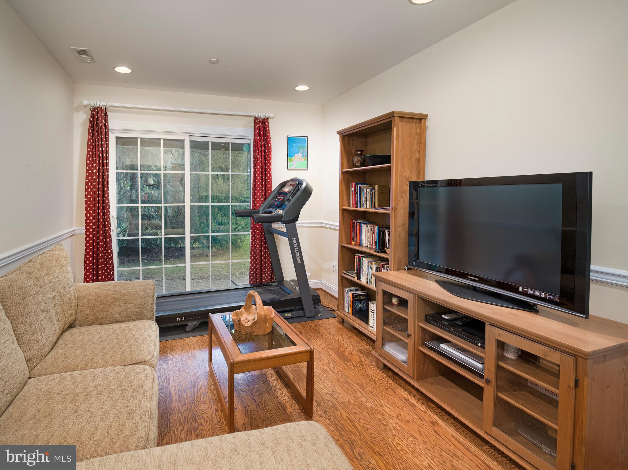 236 West Spring Avenue Ardmore, PA 19003 - Photo 26 of 30 a living room with furniture and a flat screen tv