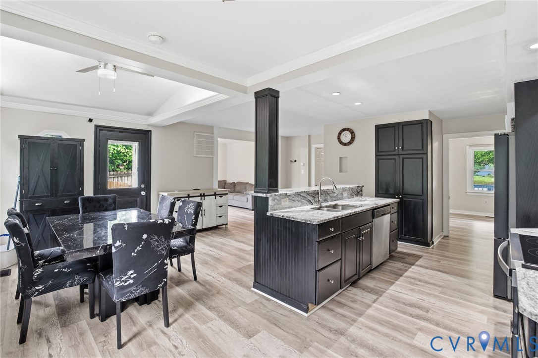 9110 Gayton Road Henrico, VA 23229 - Photo 2 of 54 a view of a kitchen island wooden floor and living room