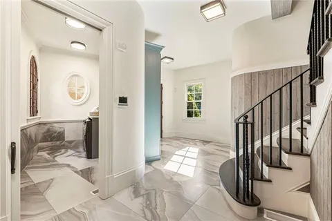 a dining room with furniture window wooden floor