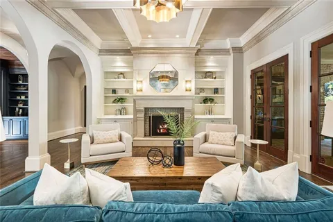 a kitchen with stainless steel appliances granite countertop a stove and a refrigerator