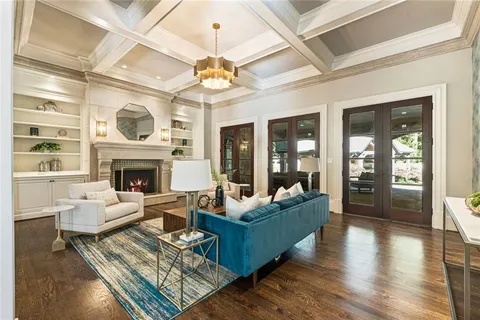 a kitchen with stainless steel appliances kitchen island granite countertop a stove and a sink