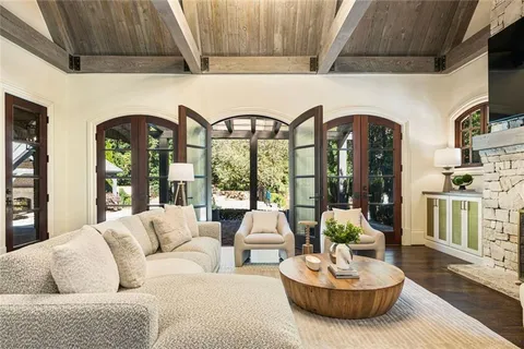 a front view of house with yard outdoor seating and green space