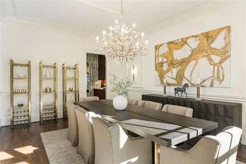 a large bedroom with a large bed and a large window